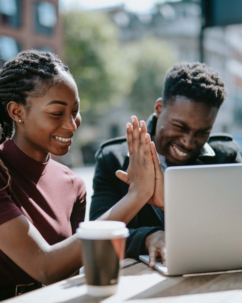 Students giving each other a high five